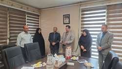 تجلیل از فرزند شهید شاغل در شبکه بهداشت و درمان شهرستان بهار