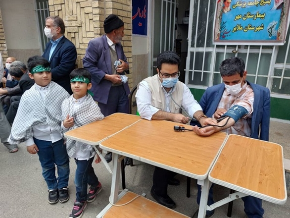 برگزاری مراسم راهیپمایی روز قدس و اندازه گیری فشارخون نمازگزاران در شهرستان ملایر